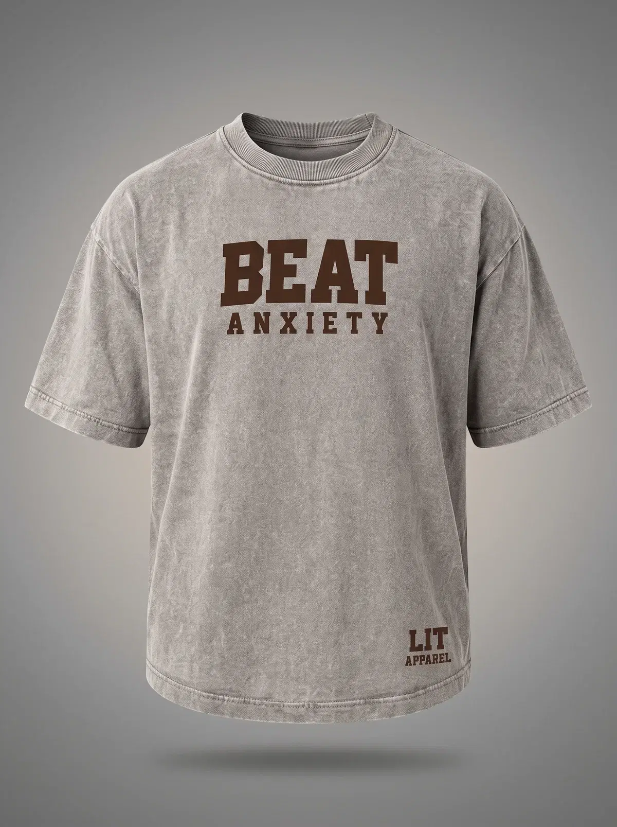 Beat Anxiety Tee in Stone Grey, photographed front-on against a paper ground.