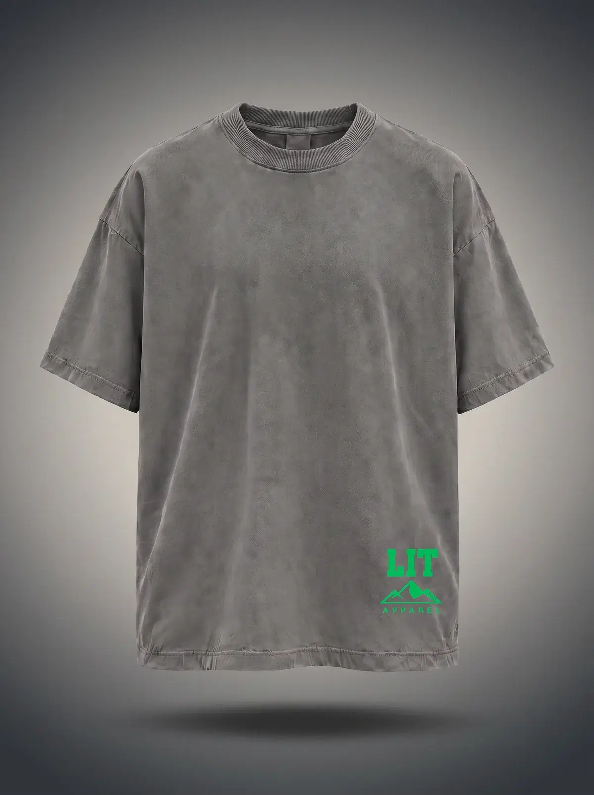 Live Intentionally Tee — Grey / Green in Washed Charcoal, photographed front-on against a paper ground.