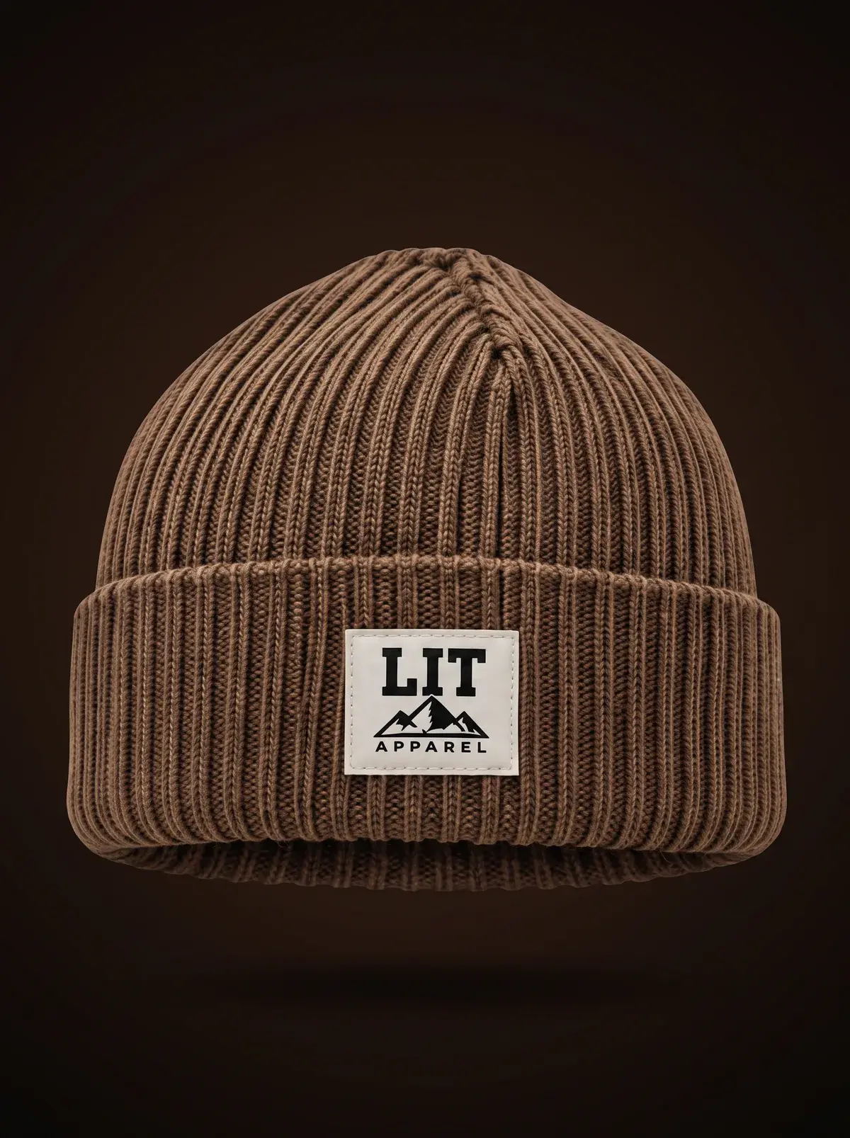Ribbed Cuffed Beanie — Brown in Burn Umber, photographed front-on against a paper ground.